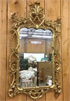 Gold framed decorative mirror