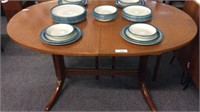 MID CENTURY OVAL DINING TABLE WITH POP-UP LEAF
