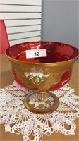 RED GLASS PEDESTAL BOWL WITH GOLD RAISED DESIGN,