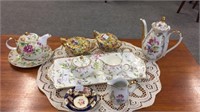 9 PIECES DECORATIVE CHINA; CREAMER AND SUGARS,