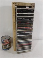 Lot de CD dans support en bois