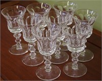 Eight Waterford crystal white wine glasses