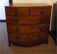 George III bow front walnut chest of drawers