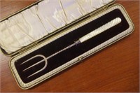 Cased sterling silver bread fork