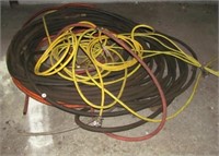 Electrical wire and air hose.