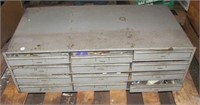 12 drawer metal organizer with contents. Contents