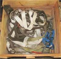Wood crate grouping of sling lift straps of