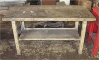 31" T x 5ft W x 30" D steel work bench.