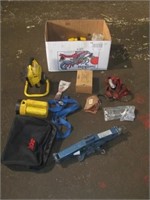 Box of various tools that includes, jack, spot