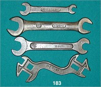 Four assorted IHC wrenches