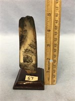 A beautiful fossilized ivory 5" artifact, scrimmed