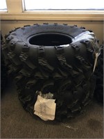 A pair of Swamp Lite 4-wheeler tires AT27X12.00-12