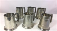 Set of six pewter mugs