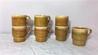 Set of seven vintage drip glaze stacking mugs