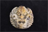 Carved jade/dragon head
