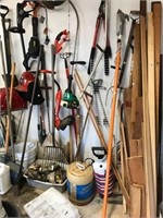 Lot of tools and garden stakes