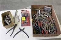 Snap ring pliers, scissors, various hand tools