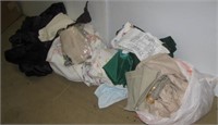 Group of various household linens and towels.