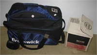 (3) Bowling balls and (1) Rolling carrying case.
