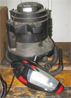 Hand held vacuum and small Eureka shop vac with