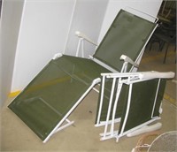 (2) Outdoor patio folding loungers.