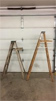 2 wooden step ladders