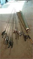 6 fishing poles and a case