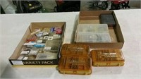 2  boxes of  packages of fishing tackle and misc.