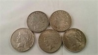 5 silver dollars dated 1921 (2), 1922 (2) and 1926