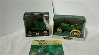 2 Ertl toy John Deere tractors and John
