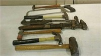 Hammers, wrench and saw