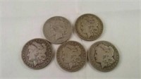 5 silver dollars dated 1879 (3),1882 and 1922