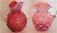 2 CRANBERRY OPALESCENT PITCHERS WITH APPLIED