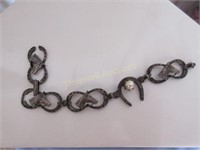 Unusual silver horseshoe bracelet