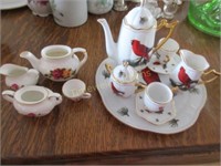 2 Miniature tea sets