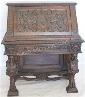 ORNATELY CARVED 19TH C. MAHOGANY FALL-FRONT DESK