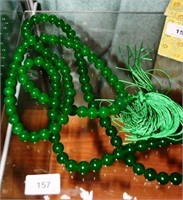 Long strand of green jade prayer beads