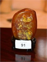 Chinese amber coloured soapstone boulder