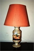 Capodimonte table lamp, embossed cherub