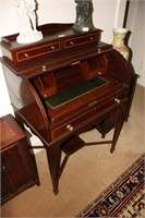 Antique cylinder roll top desk, flame mahogany