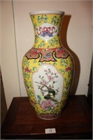 Pair of Chinese vases, each decorated with panels