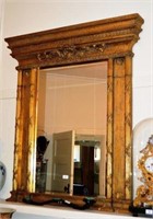Ornate gilt framed Empire style mirror,