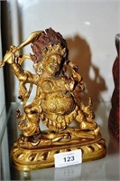 Antique gilt bronze Buddhist Mahakala with raised