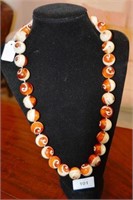 Unusual amber and cream coloured glass beaded