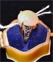 18ct gold ring set with oval opal, green & blue