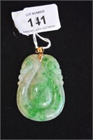 Carved green jade pendant, 18ct gold mount,