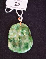 Large green jade pendant, carved detail with