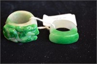 2 Chinese jade rings with carved detail