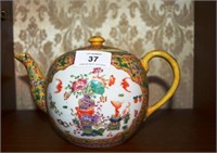 Chinese famille rose teapot, ornately decorated,