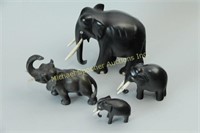 GROUPING OF FOUR ELEPHANTS
